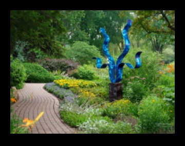 Sculpted Whispers: The Allure of Outdoor Garden Art